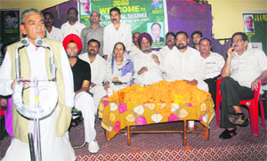 PDP leader Yash Pal Sharma addresses a public meeting in Jammu on Thursday.
