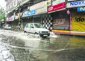 Rain woes: A waterlogged street in Srinagar on Thursday