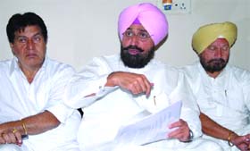 PPCC chief Partap Singh Bajwa addresses the media in Jalandhar on Thursday.