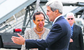 US Secretary of State John Kerry is welcomed by US Permanent Representative to the United Nations in Geneva Betty E King on Thursday.