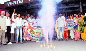 BJP workers burst crackers to celebrate the naming of Narendra Modi as the partys prime ministerial candiate, at the Fire Brigade chowk in Bathinda on Friday.