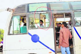 A broken windowpane of the AIMSR bus.