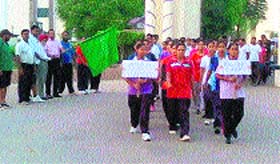 Students take out a rally to raise awareness about importance of education in Bathinda on Friday.