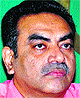 While city BJP president Sanjay Tandon (above) wants to submit a memorandum to the PM, senior leader Harmohan Dhawan is in favour of showing black flags to the PM