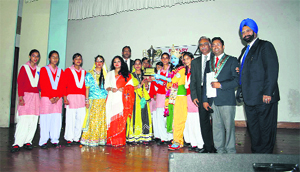The winners of the inter-school talent hunt contest with the chief guest in Mussoorie on Friday. 
