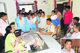 Students of Government Senior Secondary School, Kunjpura (Karnal), complain to the Principal and the police against their political science teacher (inset) on Friday. Tribune photo: Ravi Kumar