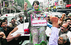 PDP president Mehbooba Mufti addresses party workers during a protest march against the alleged killings by the CRPF in Shopian, at Regal Chowk in Srinagar on Friday