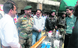 Army officials review modals at Higher Secondary School, Binoon, on Friday. A Tribune photograph