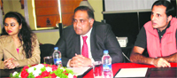 Lalit Grand Palace general manager Jagdeep Nambiar addresses mediapersons in Srinagar on Friday. Tribune Photo: Amin War
