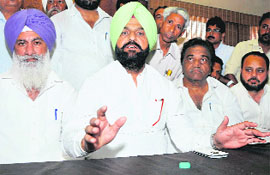 Former Bathinda legislator Harminder Singh Jassi along with Sardulgarh MLA Ajit Singh Mofar and other Congress leaders addresses mediapersons in Bathinda on Saturday. 