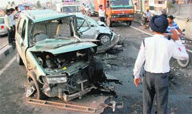 The mangled remains of the cars that met with an accident on the Zirakpur flyover on Saturday.