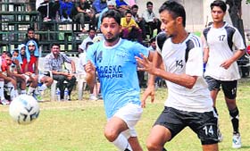 Players in action during the Inter-College Football Tournament at Panjab University in Chandigarh on Saturday.