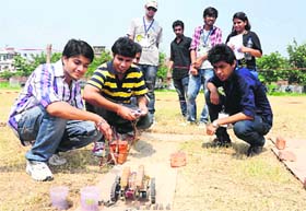 Students display their models at the University Institute of Engineering and Technology in Sector 25, Chandigarh, on Saturday.