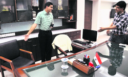 Rahul Tiwari (right), former Deputy Commissioner of Ludhiana, hands over the charge to Rajat Aggarwal in Ludhiana on Saturday. Tribune Photo: Himanshu Mahajan 