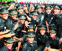 Woman officers jubilate after the passing out parade in Chennai on Saturday