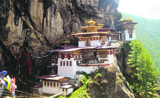 The iconic Taktsang monastery (Tigers nest) is perched on a steep cliff at the height of 1000 metre above the Paro valley. This was the site where Bhutans revered Guru Rinpoche (Padmasambhava), founder of Tantric Buddhism, meditated in a cave 