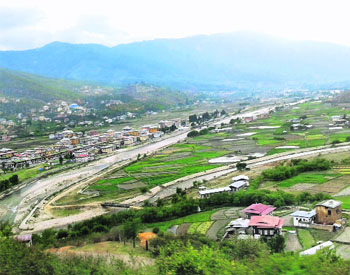 A view of the Paro valley from the Paro dzong. One can see the Paro Chhu River meandering in the valley