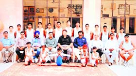 Members of the PBN Senior Secondary School pose for a photgraph after winning the District Gymnastics Tournament in Amritsar on Sunday