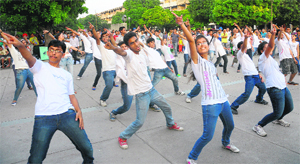 Students of the Chandigarh College of Engineering and Technology take part in a flash mob at the Sector 17 Plaza in Chandigarh on Sunday.