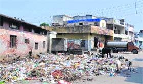 Garbage dumped near a residential colony in Haridwar