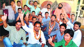 Newly elected office-bearers of the Students Welfare Council of Gurukul Kangri University seek the blessings of saints at an ashram in Haridwar on Sunday.