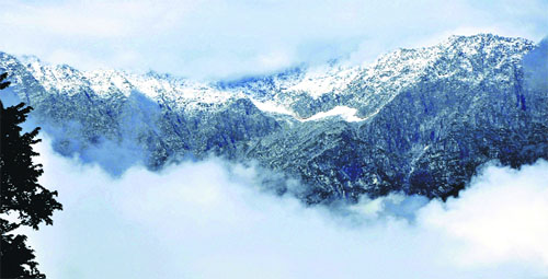 A view of the snow-clad Dhauladhars as seen from Dharamsala on Sunday. 