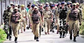 Police personnel led by Director General of Police Ashok Prasad in Shopian on Sunday.