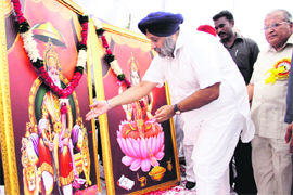 Deputy Chief Minister Sukhbir Singh Badal pays obeisance to Maharaja Agarsain at a function in Jalandhar on Sunday. 