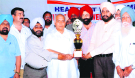 Members of the Virk Enclave Welfare Society honour MP Mohinder Singh Keypee in Jalandhar on Sunday. 