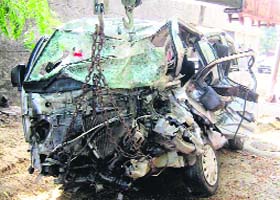 The mangled remains of the Tata Venture utility vehicle that met with an accident on the Barnala-Bajakhana road near Barnala on Saturday night