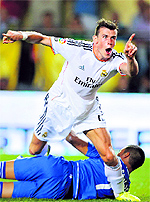 Gareth Bale celebrates after scoring during Real Madrids Spanish league match against Villarreal at El Madrigal stadium in Villareal on Saturday