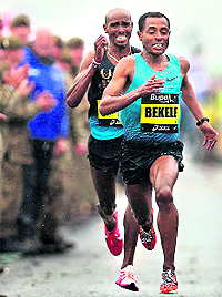 Ethiopias Kenenisa Bekele beats Britains Mo Farah as they charge to the finish line of the Great North Run half marathon in South Shields, near Newcastle, on Sunday