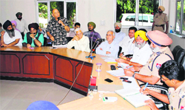 Commissioner of Police, Amritsar, Jatinder Singh Aulakh at a meeting with representatives of various social and trade organisations in Amritsar on Monday. 