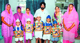 Students of Sri Guru Harkrishan Public School celebrate the Gurgaddi Divas of Guru Ram Das and Guru Arjan Dev in Amritsar on Monday. 
