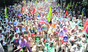 Family members of the farmers, who committed suicide owing to debt, stage a protest outside the residence of the Deputy Commissioner in Bathinda on Monday. The protest was held under the banner of the Bharatiya Kisan Union