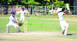 A player is out stumped during a match between Government Rajindra College and National College for Physical Education, Chupki. The match was held at the Police Public School grounds in Bathinda on Monday.