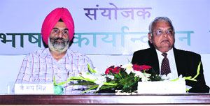CUP VC Dr Jai Rup Singh (left) with the guest of the day at the Hindi Diwas function in Bathinda on Monday.
