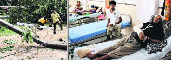 An electric pole that fell on a road in Sector 32; and (right) Victims Gulam Navi and Jitender Kumar admitted to the Sector 16 hospital in Chandigarh on Monday.