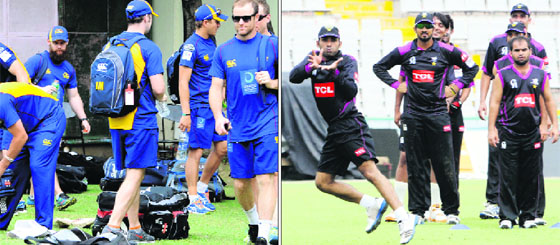 Members of Otaga Volts; and (right) players of Faisalabad Wolves during a practice session at the PCA stadium in Mohali on Monday. 