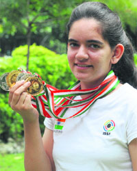 International shooter Anjum Moudgil shows her medals. She defeated three-time Olympian Anjali Bhagwat during the 10th Masters Shooting Championship at Tughlakabad and won five medals, including 2 gold and 3 silver.