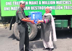 Kalpna Nautiyal, secretary, Ex-servicemens Wives Welfare Association, hands over relief material to Colonel KS Jaggi, Commanding Officer, 127 Eco Task Force, in Dehradun on Monday
