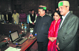 Health Minister Kaul Singh Thakur launches the HP State Dental Council website and online registration system in Shimla on Monday.