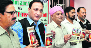Dignitaries launch the book titled Ahkaam Aur Amal in Jammu on Monday.