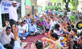 Members of the B.Ed Teachers' Union hold a dharna in front of the District Education Office in Jalandhar on Monday.