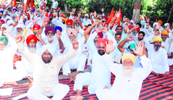 Members of the Kirti Kisan Union protest at the Company Bagh in Amritsar on Tuesday.