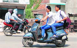 Underage driving in the city is rampant as the traffic police looks the other way. 