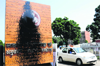 The defaced logo of the PGI. Tribune photo: Manoj Mahajan