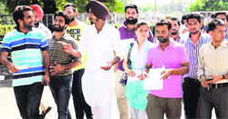 PUCSC leaders on their way to submit a memorandum to the VC regarding the irregularities in awarding fellowships to research scholars in Chandigarh on Tuesday. 