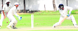 A player loses his wicket during a Katoch Shield Cricket Championship match in Chandigarh on Tuesday. Tribune Photo: parvesh chauhan