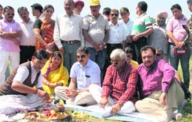 Sports Minister Dinesh Agarwal performs puja at the stone-laying ceremony of a new sports complex at Parade Ground in Dehradun on Tuesday.